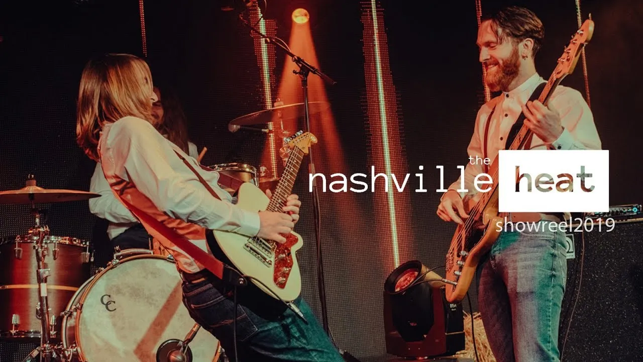 Two musicians playing electric guitar and bass on stage with drums in background and 'nashville the heat showreel 2019' text overlay.